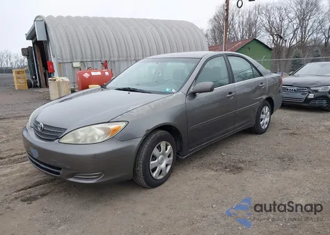 2004 Toyota Camry Le z USA, uszkodzony, nr VIN 4T1BE32K14U863071